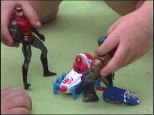 animated gif of children's hands manipulating superhero action figures