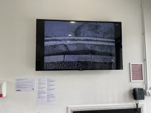 'Double Yellow' a video by Rabia Raja, displayed on a wall-mounted screen at WSA