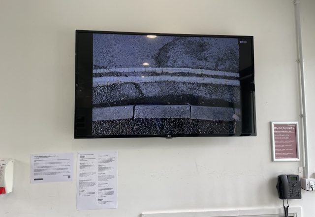 'Double Yellow' a video by Rabia Raja, displayed on a wall-mounted screen at WSA
