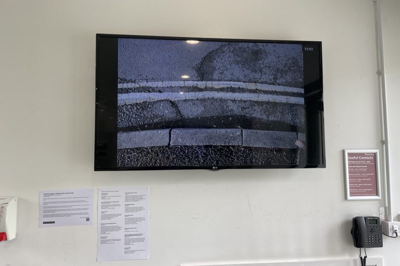 'Double Yellow' a video by Rabia Raja, displayed on a wall-mounted screen at WSA